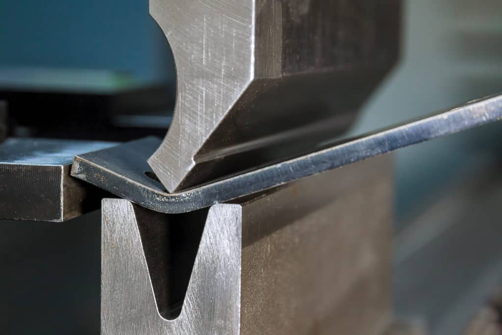 thick metal plate in bending process close-shot