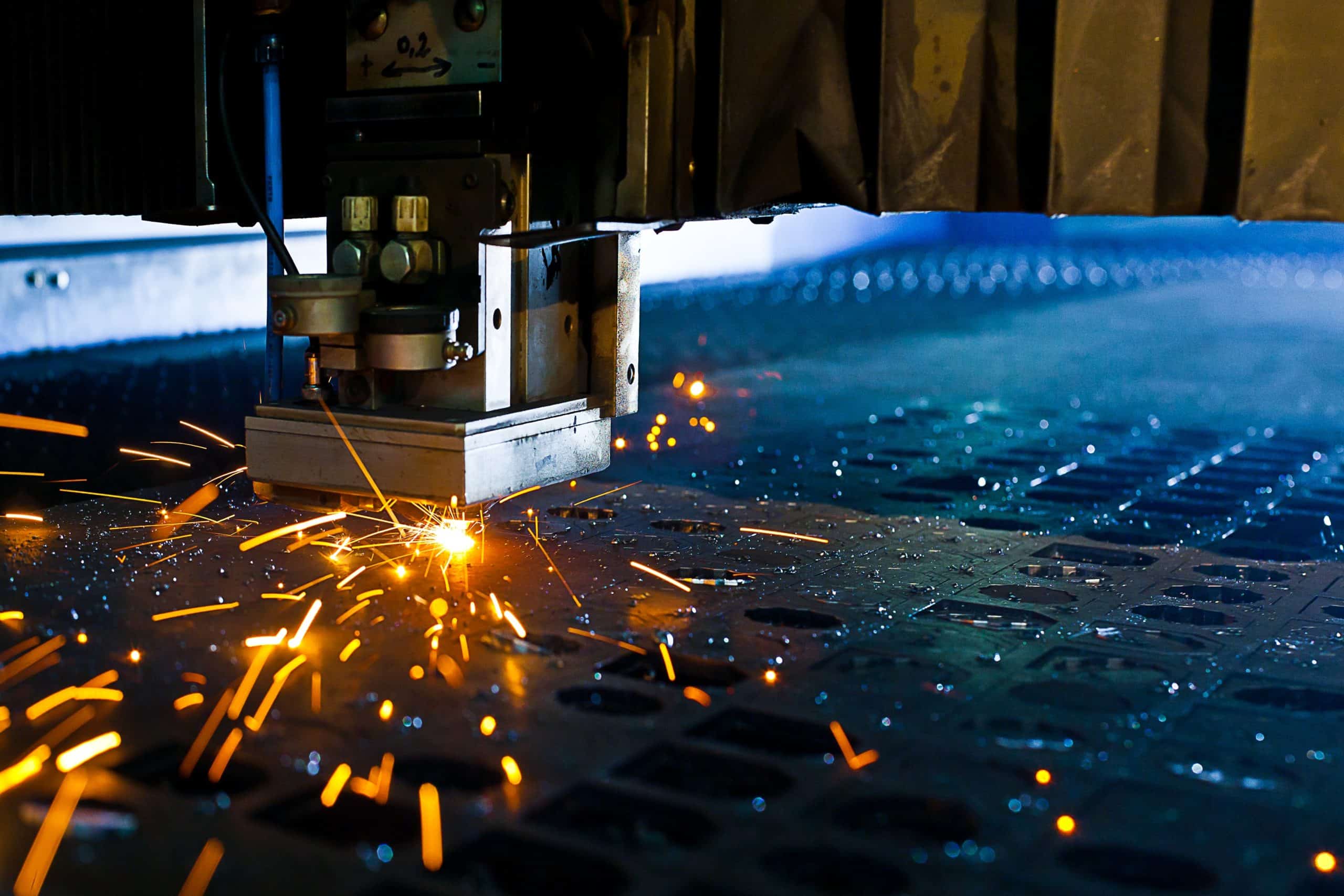 laser cutting on sheet metal close shot