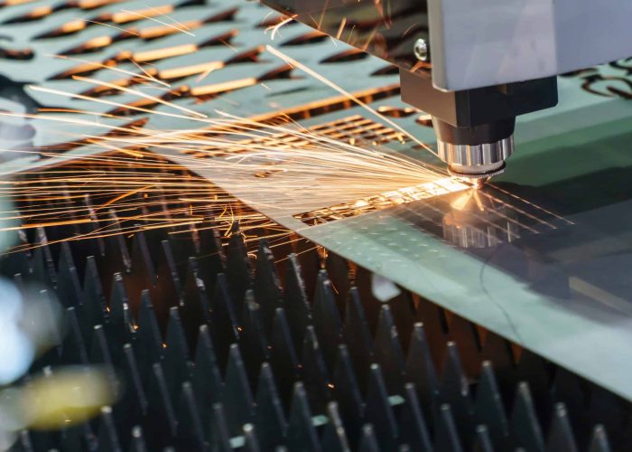 laser cutting spark laser cutting on a thin metal plate with spark