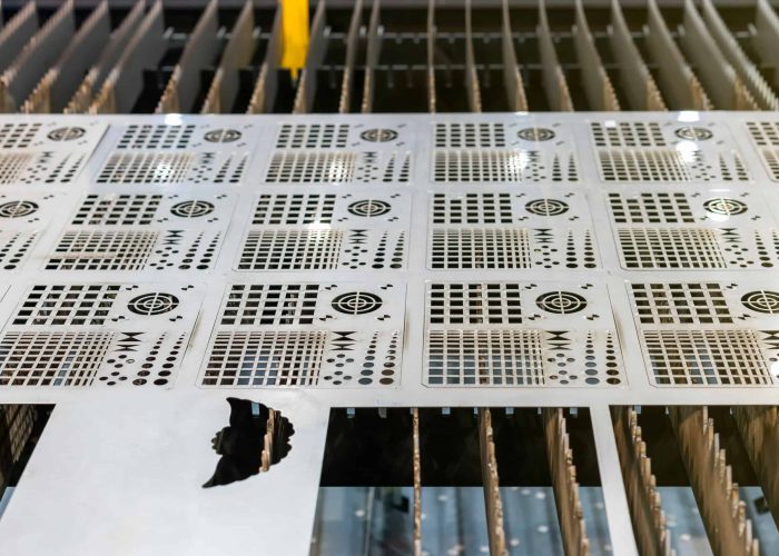 fine sheet metal plate on laser cutting table