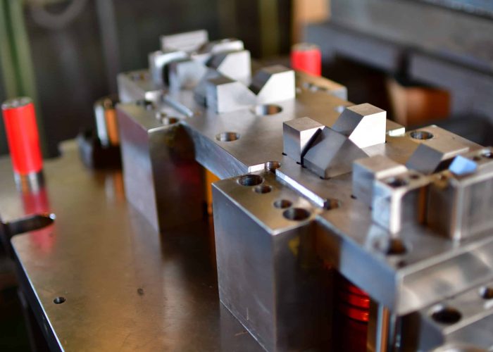 Metal stamping progressive die in close shot