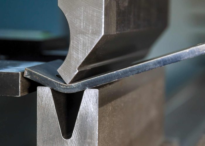 thick metal plate in bending process close-shot