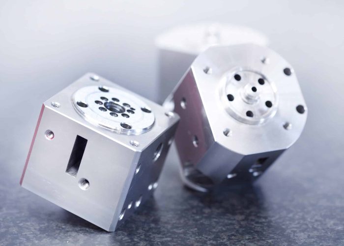 two aluminum machining part line up