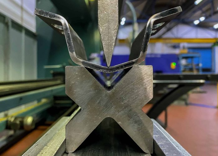 bended part on a punch machine for next punching work